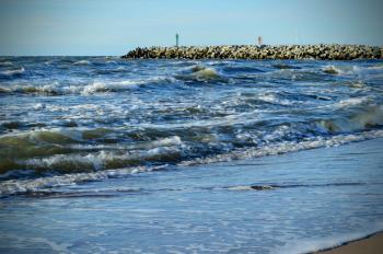 Baltic Sea coast with waves and a breakwater