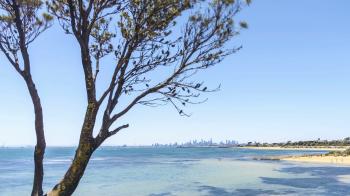 Time lapse. Distance and far view of Melbourne city skyline from ...
