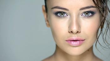 Closeup face of a beautiful girl with long fringe of wet hairs. Full ...