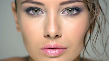 Closeup face of a beautiful girl with long fringe of wet hairs. Full ...