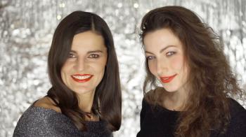 Two, beautiful women smiling to the camera, steadycam shot Stock ...