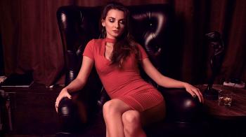 Portrait of gorgeous beauty young brunette woman in red dress ...