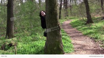 Girl Playing Hide-and-seek. It Is Hidden Behind The Tree And They ...