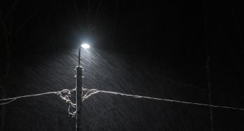 Black Electric Lamp Post With Lighted Lamp during Nighttime