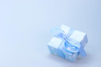 Blue and White Polka Dot Gift Box With Blue Ribbon