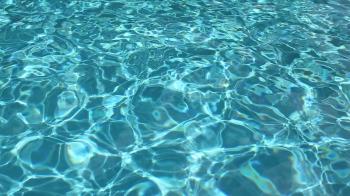 Blue water swimming pool, real water texture motion background ...