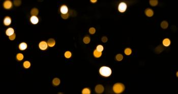 defocused bokeh blue Christmas light on dark background, loop Stock ...