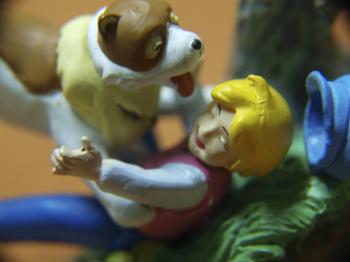 Boy and dog, macro toys