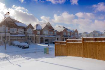 Brown 2-storey Houses during Snow