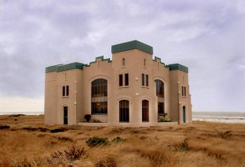 Brown Concrete Mansion at the Middle of Nowhere