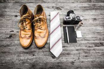 Brown Leather Oxford Wingtip Shoes Beside White and Red Necktie