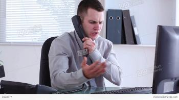 Irritated Businessman Hanging Up A Phone Stock video footage | 3928577