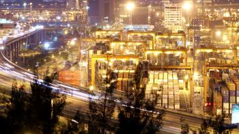 Busy City Night Timelapse. Cargo Container Terminal and Busy Traffic ...