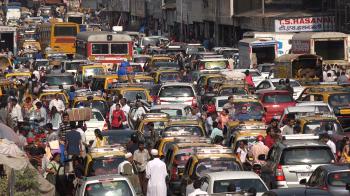 Busy traffic near a market in Mumbai Stock Video Footage - Videoblocks