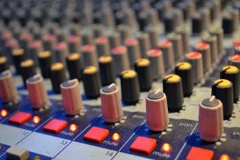 Buttons on an audio mixing board