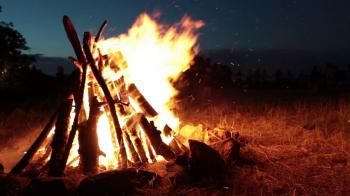 Burning camping fire in the night, stars sky background Stock Video ...