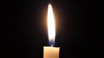 a Lit Candle Flame Blinking at Night. Stock Video Footage - Videoblocks