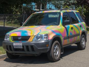 Car with colorful tye-dye paint job
