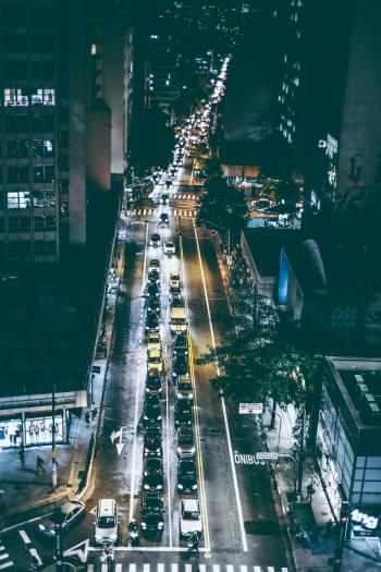 Cars on Black Asphalt Road during Nighttime