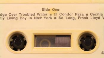Macro static camera view of vintage audio cassette tape with a white ...
