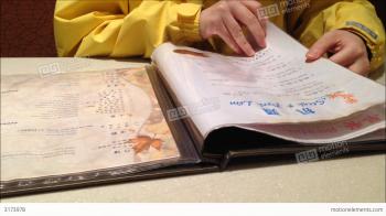 Woman Checking The Menu Inside Restaurant Stock video footage | 3173978