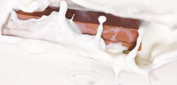 Chocolate splashing in milk