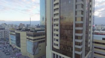 Flying over skyscraper and very beautiful city view. Aerial survey ...