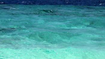Clear Ocean Water. Crystal clear Indian Ocean waters lap onto a ...