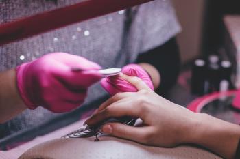 Close-up of Woman Having Manicure