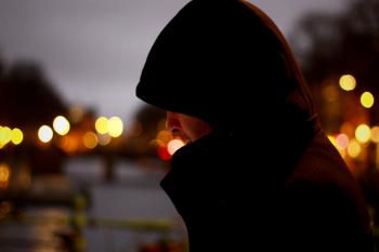 Close Up Photo of Person Wearing Hoodie
