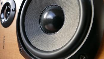 Closed Up Photography of Brown Wooden Framed Sony Speaker