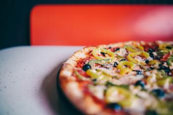 Closeup Photography of Pizza on White Surface