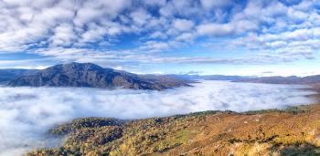 Green mountain surrounded by fogs under cloudy sky HD wallpaper ...