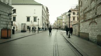 KRAKOW, POLAND - JANUARY, 14, 2017 Steadicam shot of old town street ...