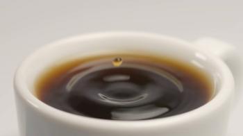 SLOW MOTION: Coffee drop falls to a white cup Stock Video Footage ...