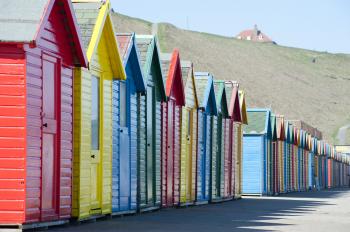 Free Stock Photo 7956 Row of colourful Beach huts | freeimageslive