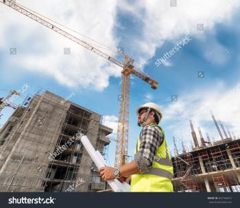 Engineering Consulting People On Construction Site Stock Photo ...