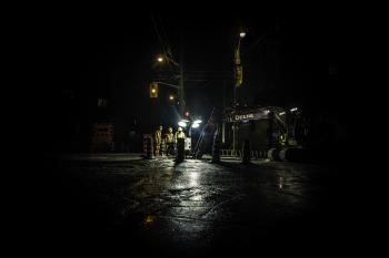 Construction Workers at Night