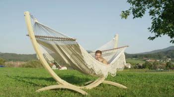SLOW MOTION: Sunny countryside surrounds lovely couple cuddling in a ...