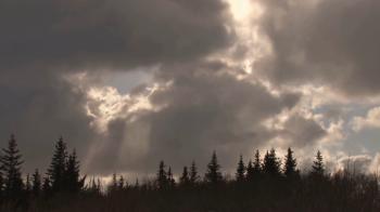Glowing Sun Covered By Shifting Clouds Stock Video Footage - Videoblocks