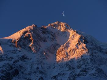 Crescent Moon over Snow Mountain