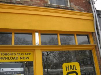 Curious storefront for the Toronto taxi smartphone app -c