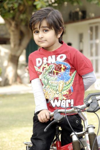 Cute Kid with Bicycle