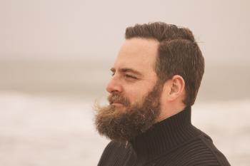 Depth of Field Photography of Man in Black Turtle Neck Top