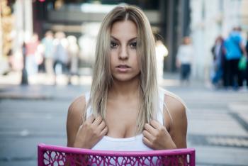 Depth of Field Photography of Woman Wearing White Tank Top