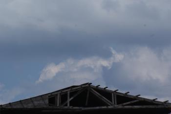 Derelict pier roof and sky