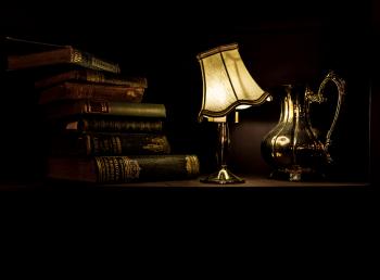 Desk with Lamp, Pitcher, and Vintage Books