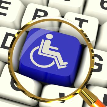 Disabled Key Magnified Shows Wheelchair Access Or Handicapped