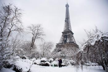 Eiffel Tower Closes as Heavy Snowfall Brings Paris to a Standstill ...