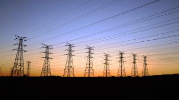 Pan of electrical power lines and pylons at dusk Stock Video Footage ...